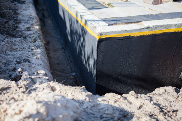 Professional Exterior Waterproofing technician working in Westport, NC